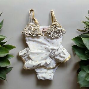 12 month one piece swimsuit. Tight. No buttons. Ruffles/gold hearts.